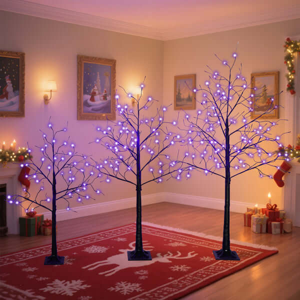 Halloween ghost trees with lights in a cozy living room, designed for spooky season décor.